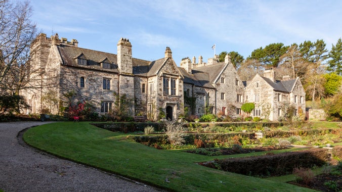 Front of the house in early morning light in November at Cotehele, Cornwall